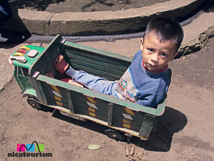Down hill racer Kid street racer in Granada, Nicaragua
