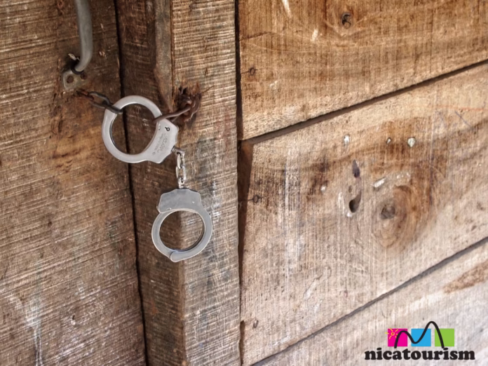 Handcuffs used as a door lock